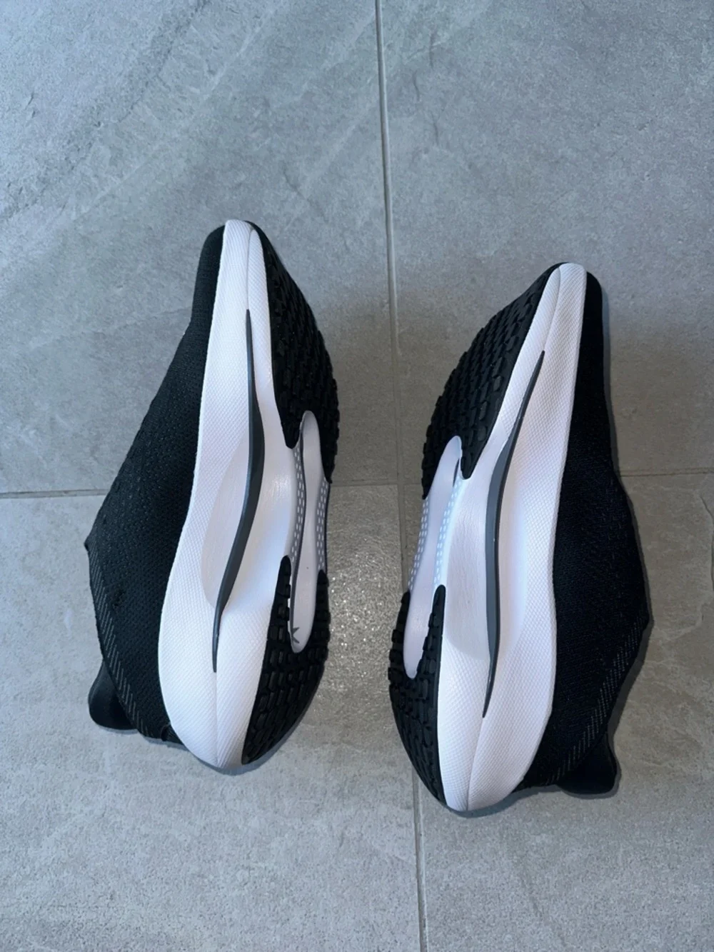 Nike Black Knit Slip-On Sneakers with White Swoosh